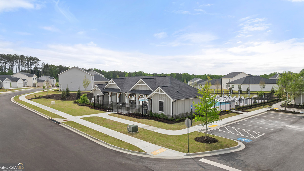 8578 Seabiscuit Road Lithonia, GA 30058 - Photo 4 of 4 a view of a city with tall buildings