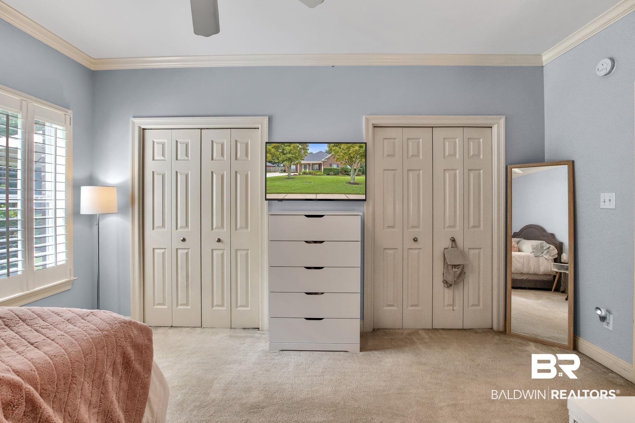 9478 Autauga Bend Daphne, AL 36526 - Photo 27 of 73 Carpeted bedroom with multiple closets, ornamental molding, and ceiling fan