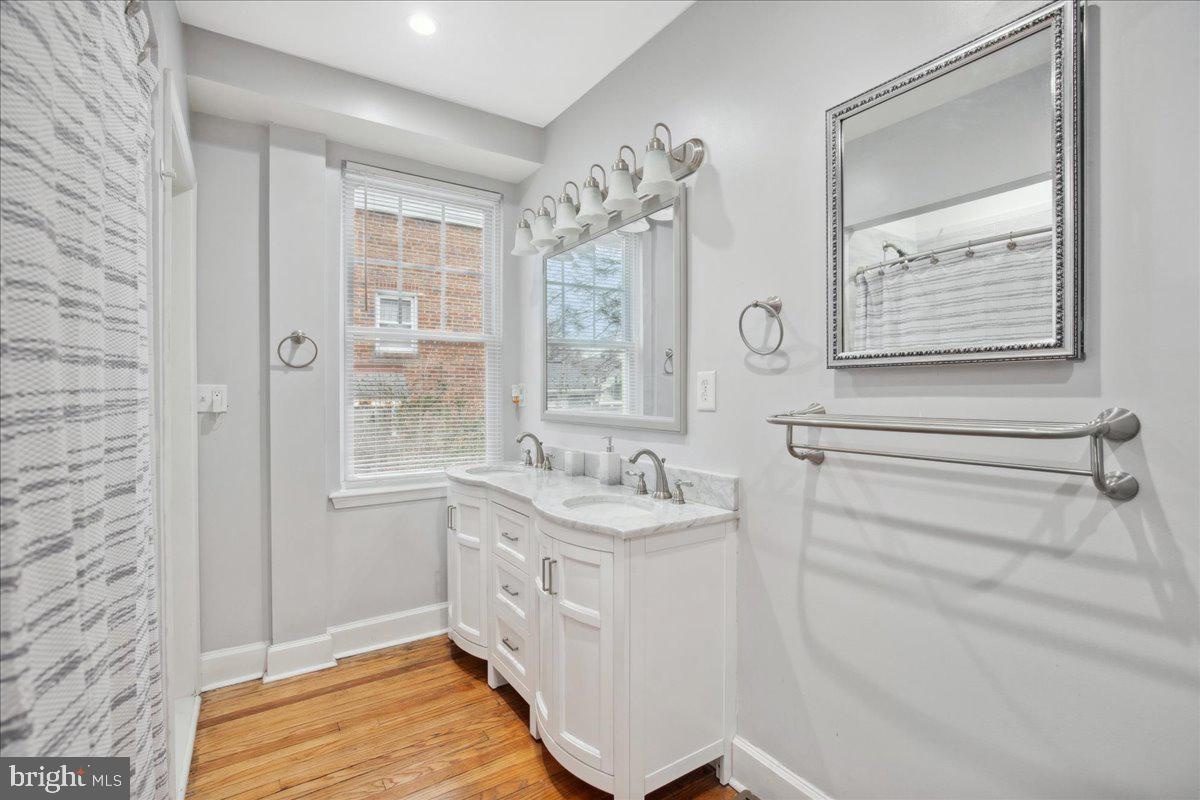 22 Cedarwood Road Catonsville, MD 21228 - Photo 20 of 44 a bathroom with a sink and a bathtub