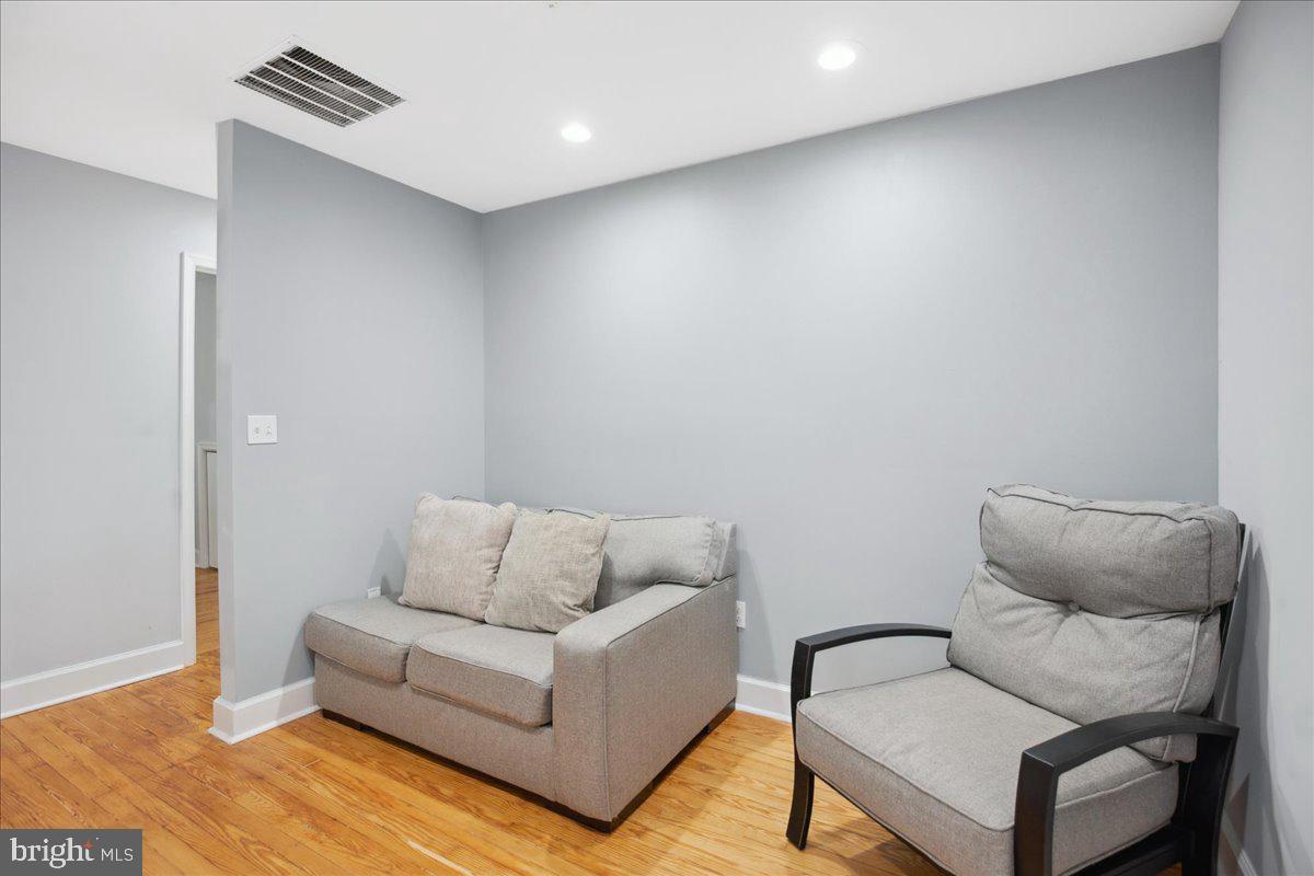 22 Cedarwood Road Catonsville, MD 21228 - Photo 23 of 44 a living room with furniture and a couch