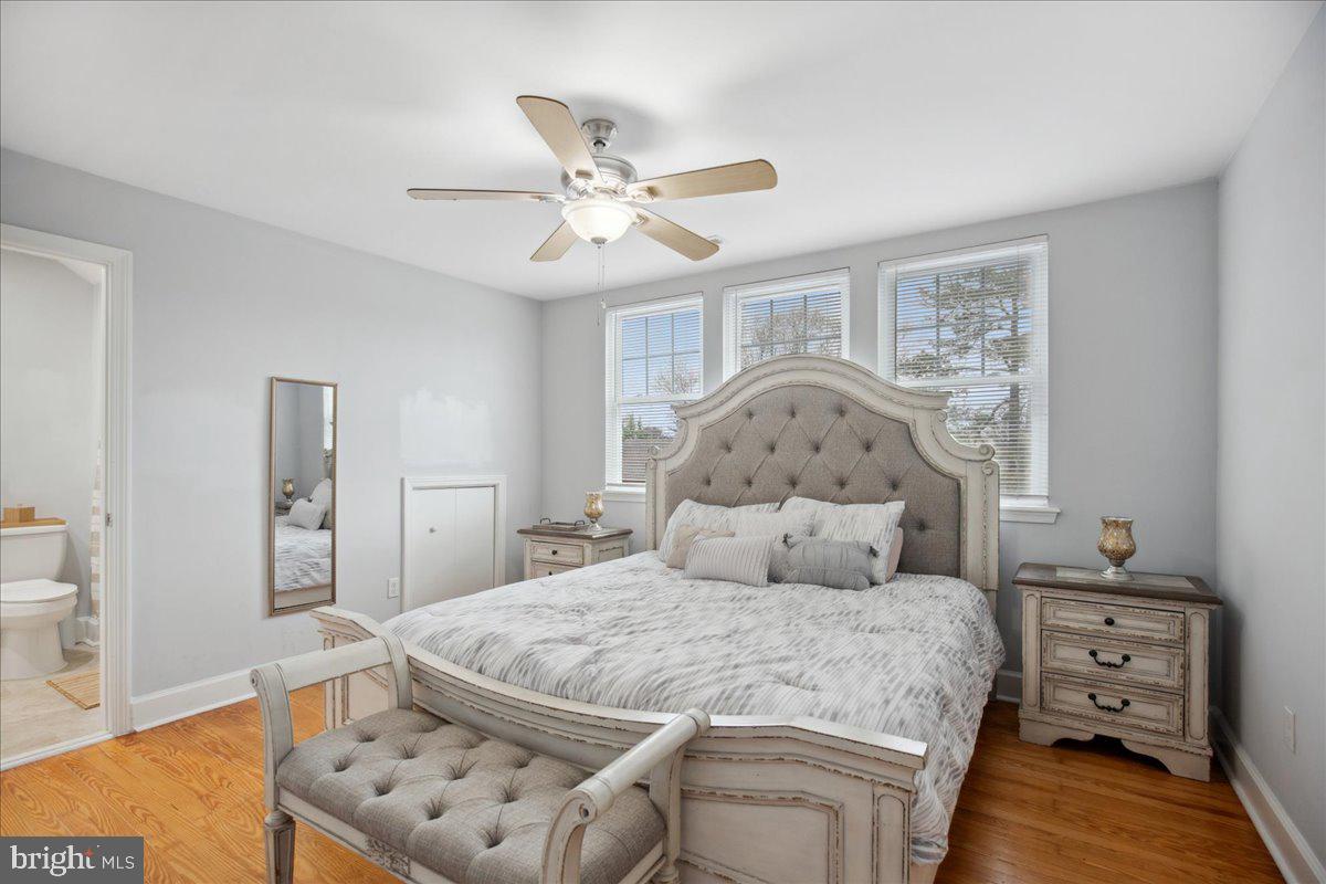 22 Cedarwood Road Catonsville, MD 21228 - Photo 24 of 44 a bedroom with a bed and wooden floor