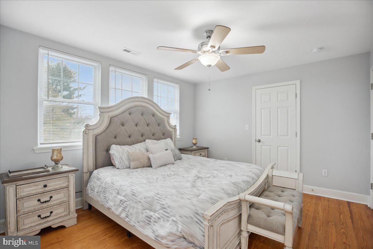 22 Cedarwood Road Catonsville, MD 21228 - Photo 25 of 44 a bedroom with a bed and a window