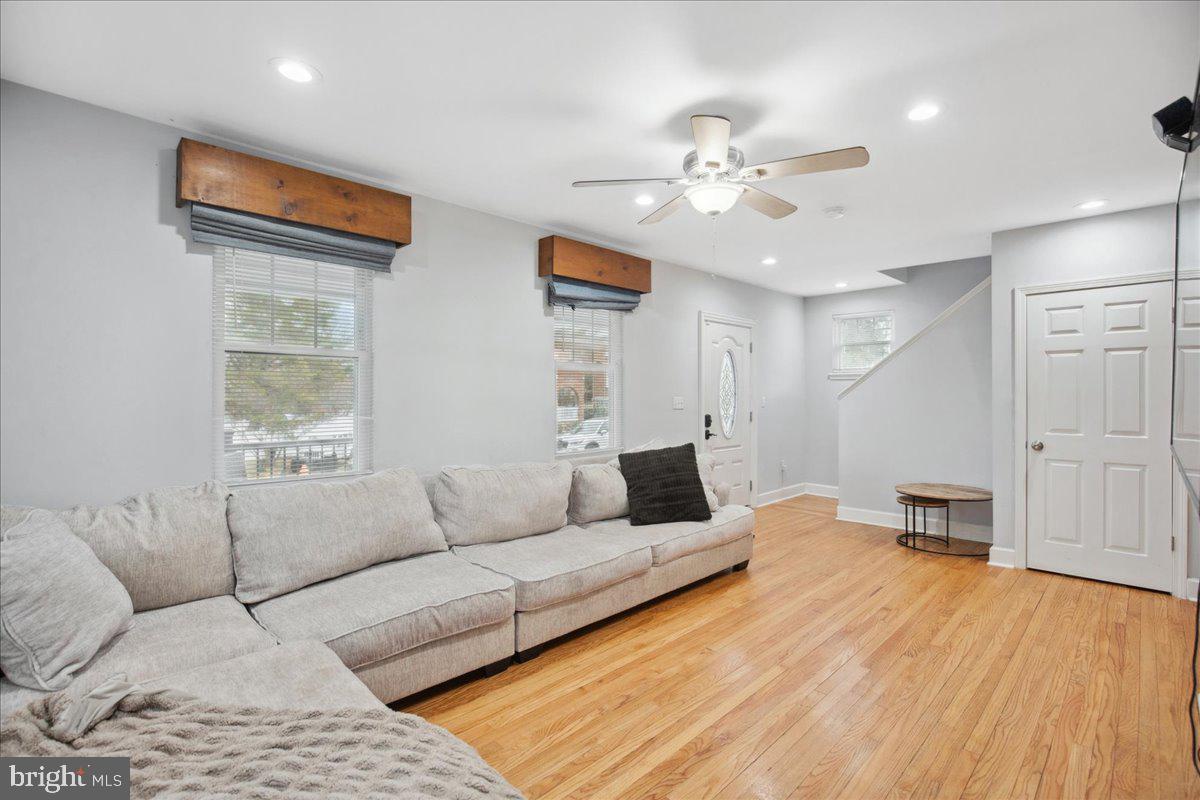 22 Cedarwood Road Catonsville, MD 21228 - Photo 8 of 44 a living room with furniture and wooden floor