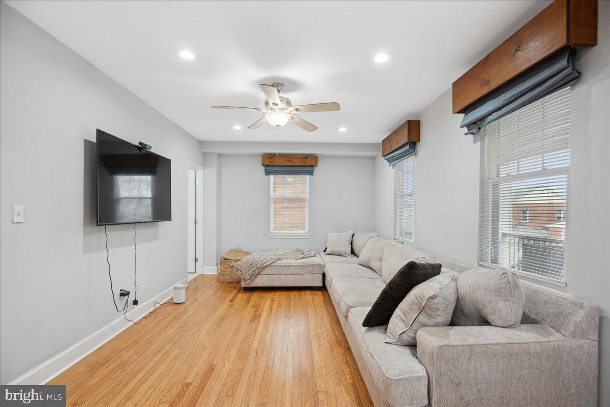 22 Cedarwood Road Catonsville, MD 21228 - Photo 9 of 44 a bedroom with a bed and a flat screen tv