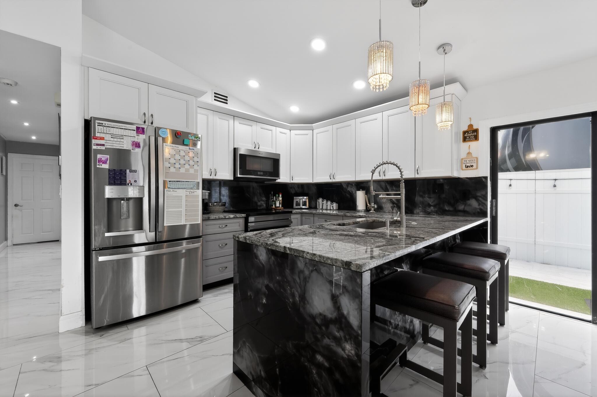 11423 Whisper Sound Drive Boca Raton, FL 33428 - Photo 21 of 39 18_11423_Whisper_Sound_Dr-Kitchen-0082