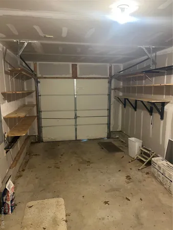 a view of a room with racks on the wall