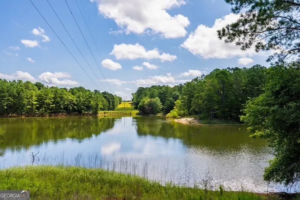 a view of a lake with a big yard