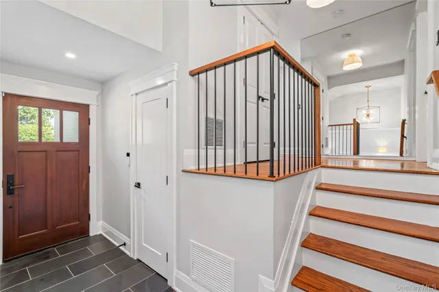 a view of a hallway with windows