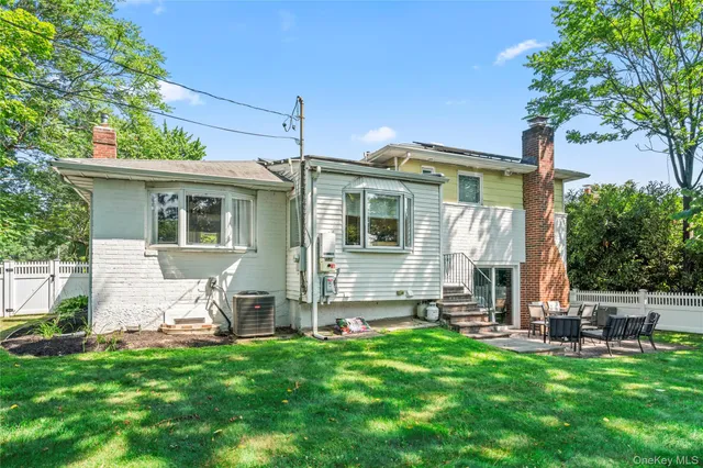 a front view of house with yard