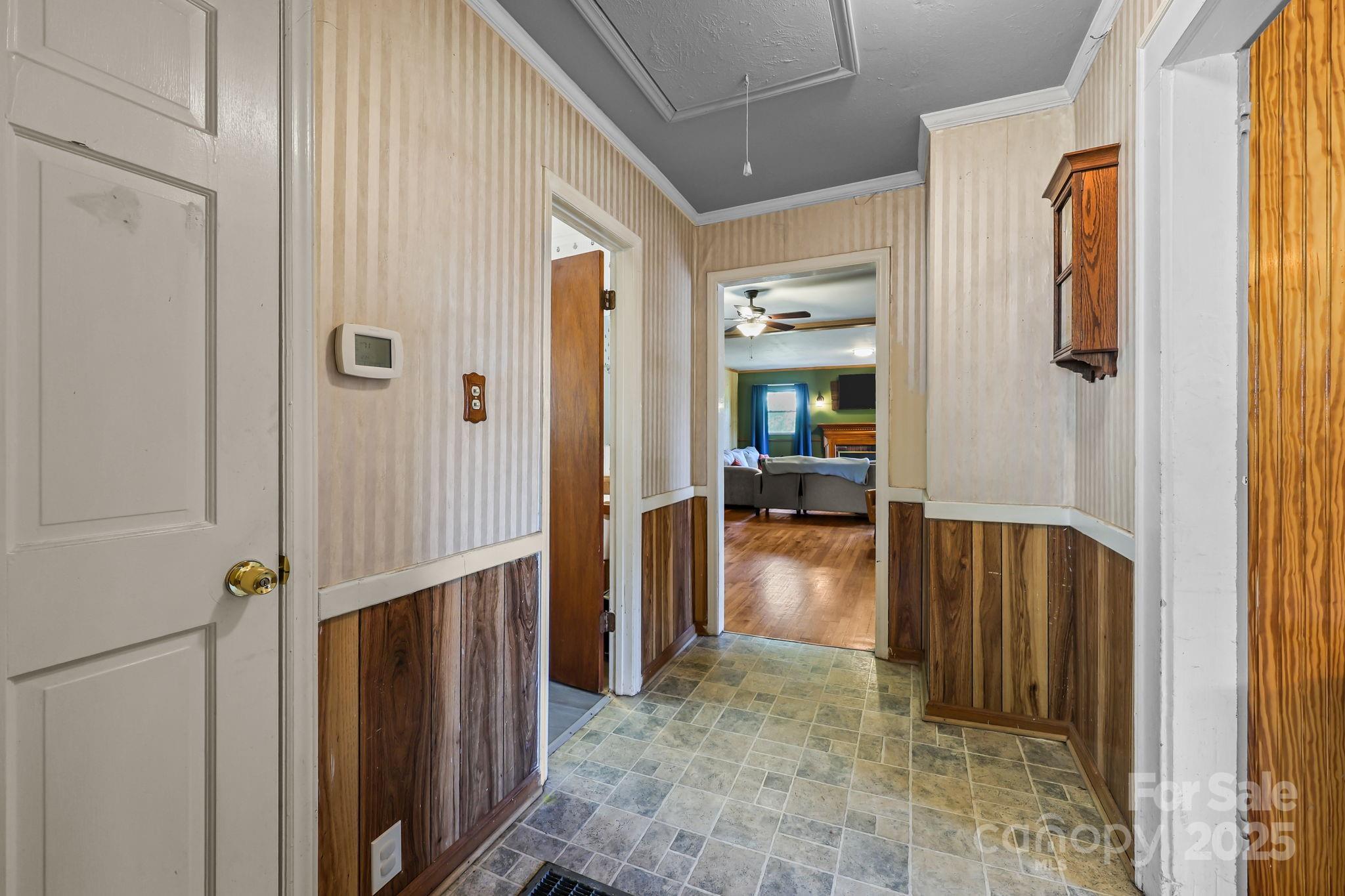 104 Pine Road Mount Holly, NC 28120 - Photo 17 of 46 a view of a hallway with a livingroom and dining room