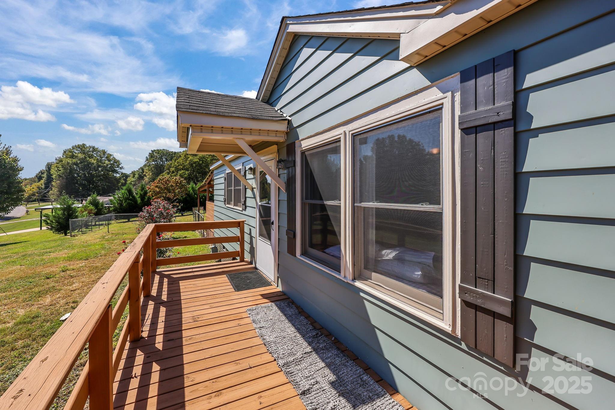 104 Pine Road Mount Holly, NC 28120 - Photo 22 of 46 a view of swimming pool with a lounge chairs