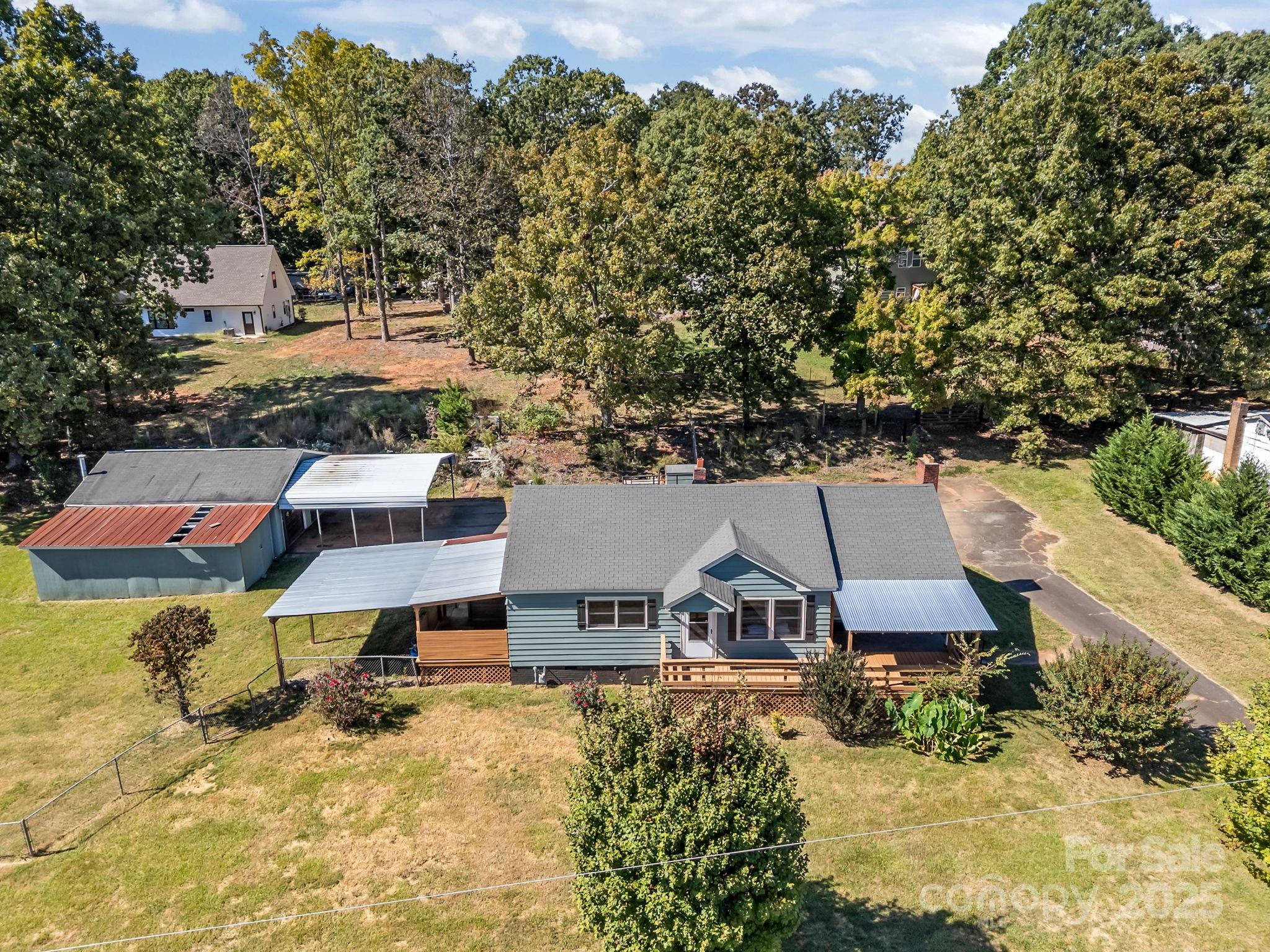 104 Pine Road Mount Holly, NC 28120 - Photo 38 of 46 an aerial view of a house with a yard