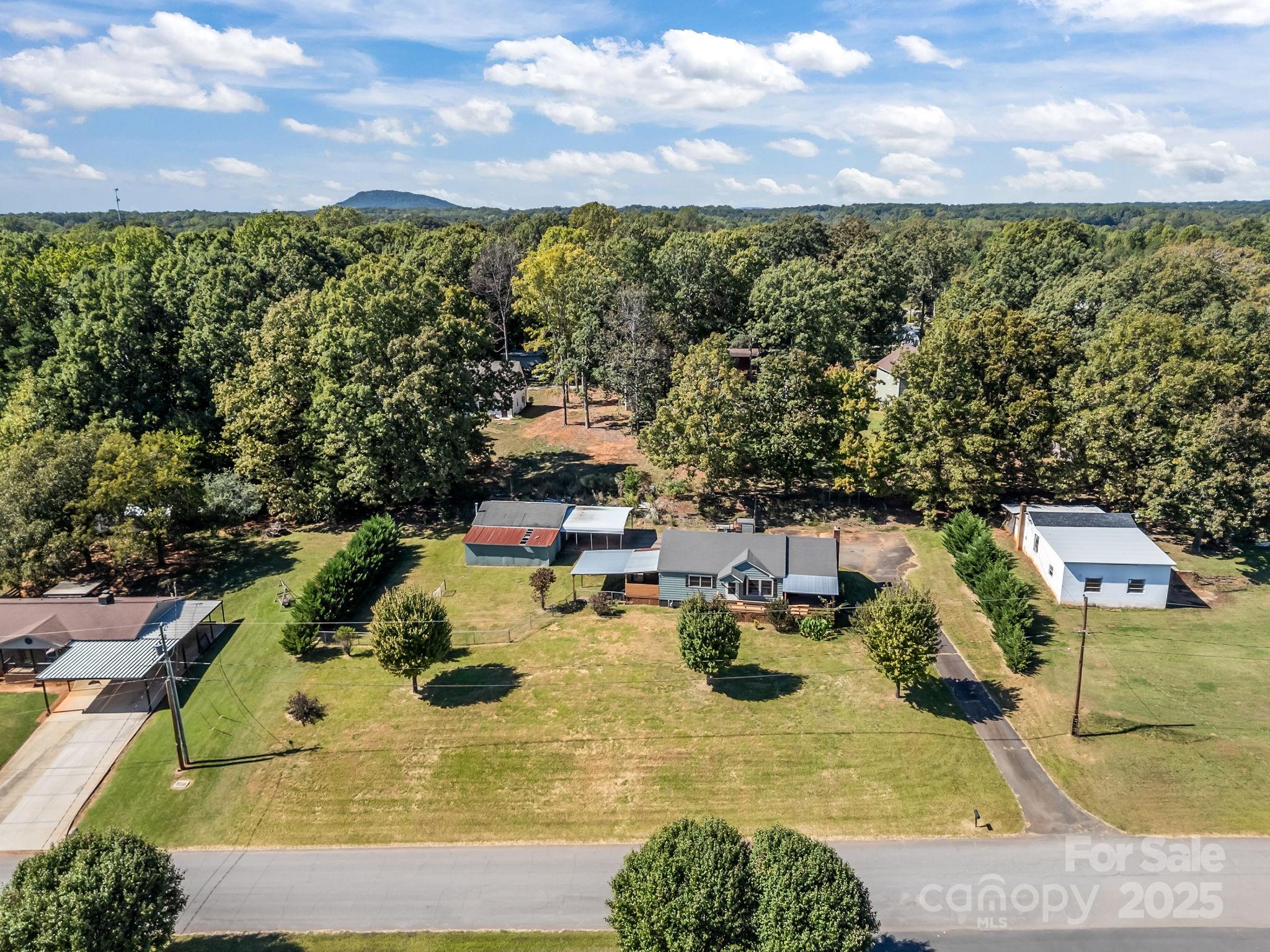 104 Pine Road Mount Holly, NC 28120 - Photo 39 of 46 an aerial view of a house with a yard