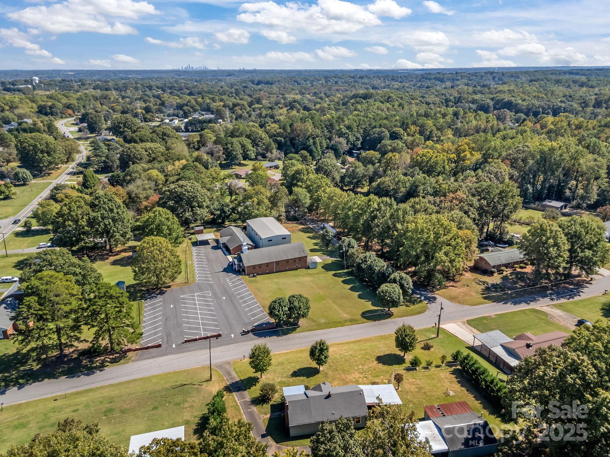 104 Pine Road Mount Holly, NC 28120 - Photo 43 of 46 an aerial view of residential houses with outdoor space