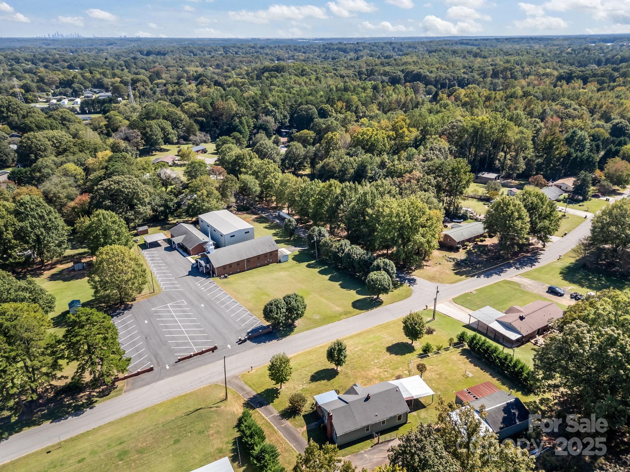 104 Pine Road Mount Holly, NC 28120 - Photo 44 of 46 an aerial view of residential houses with outdoor space