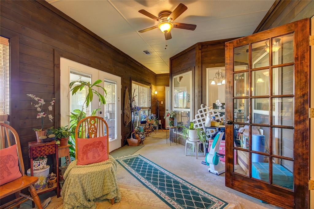 1066 Canyon Lake Road Wills Point, TX 75169 - Photo 24 of 40 a very nice looking living room with furniture and a large window