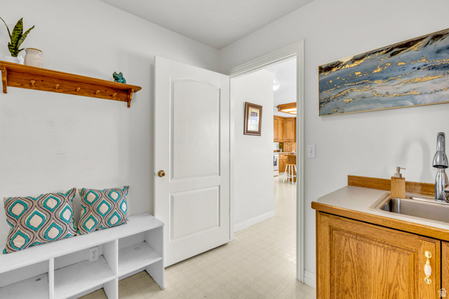 1060 West 2620th Street South Mapleton, UT 84664 - Photo 23 of 87 Mudroom featuring light flooring and a sink