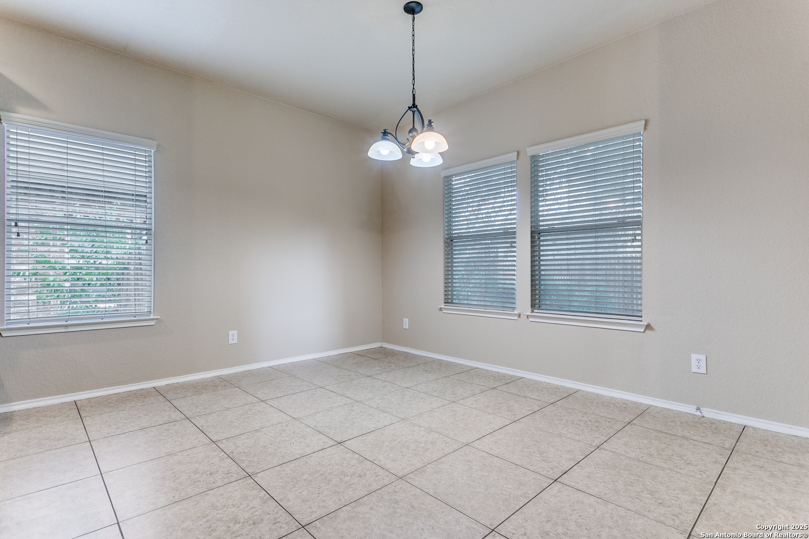 3418 Alonzo Fields Converse, TX 78109 - Photo 13 of 36 a view of an empty room with windows