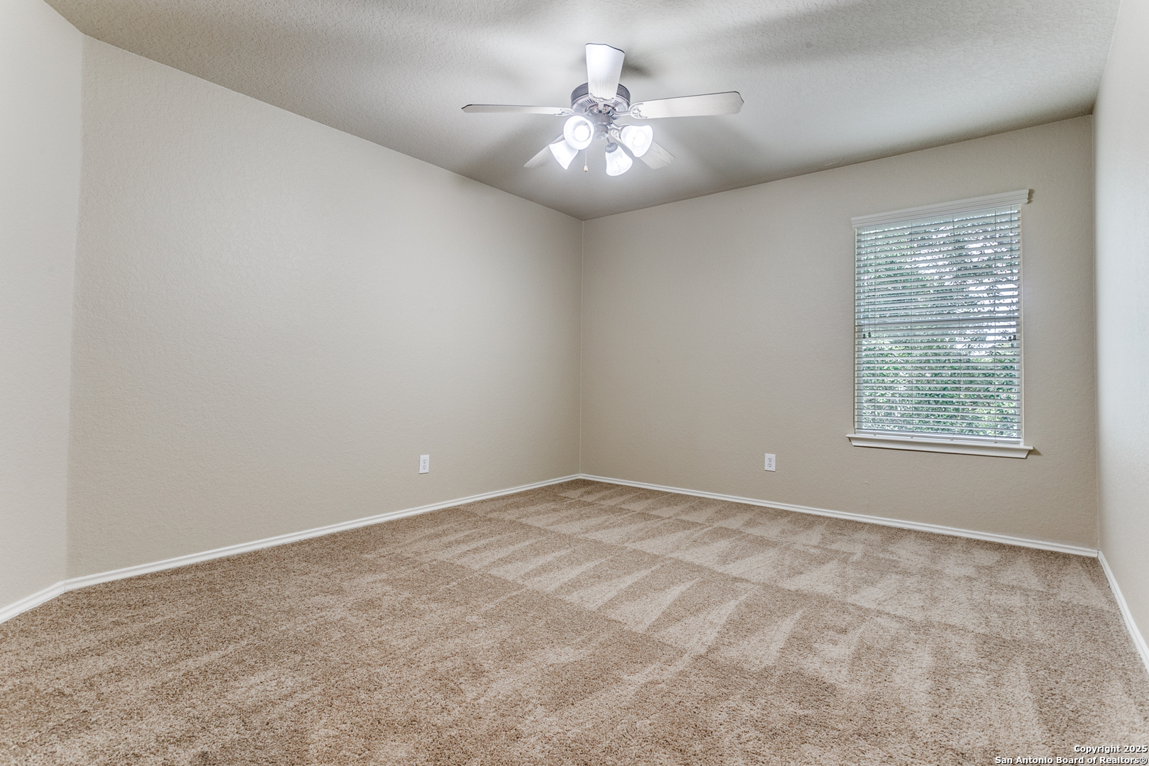 3418 Alonzo Fields Converse, TX 78109 - Photo 24 of 36 an empty room with windows and fan