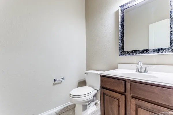 a bathroom with a sink and a toilet