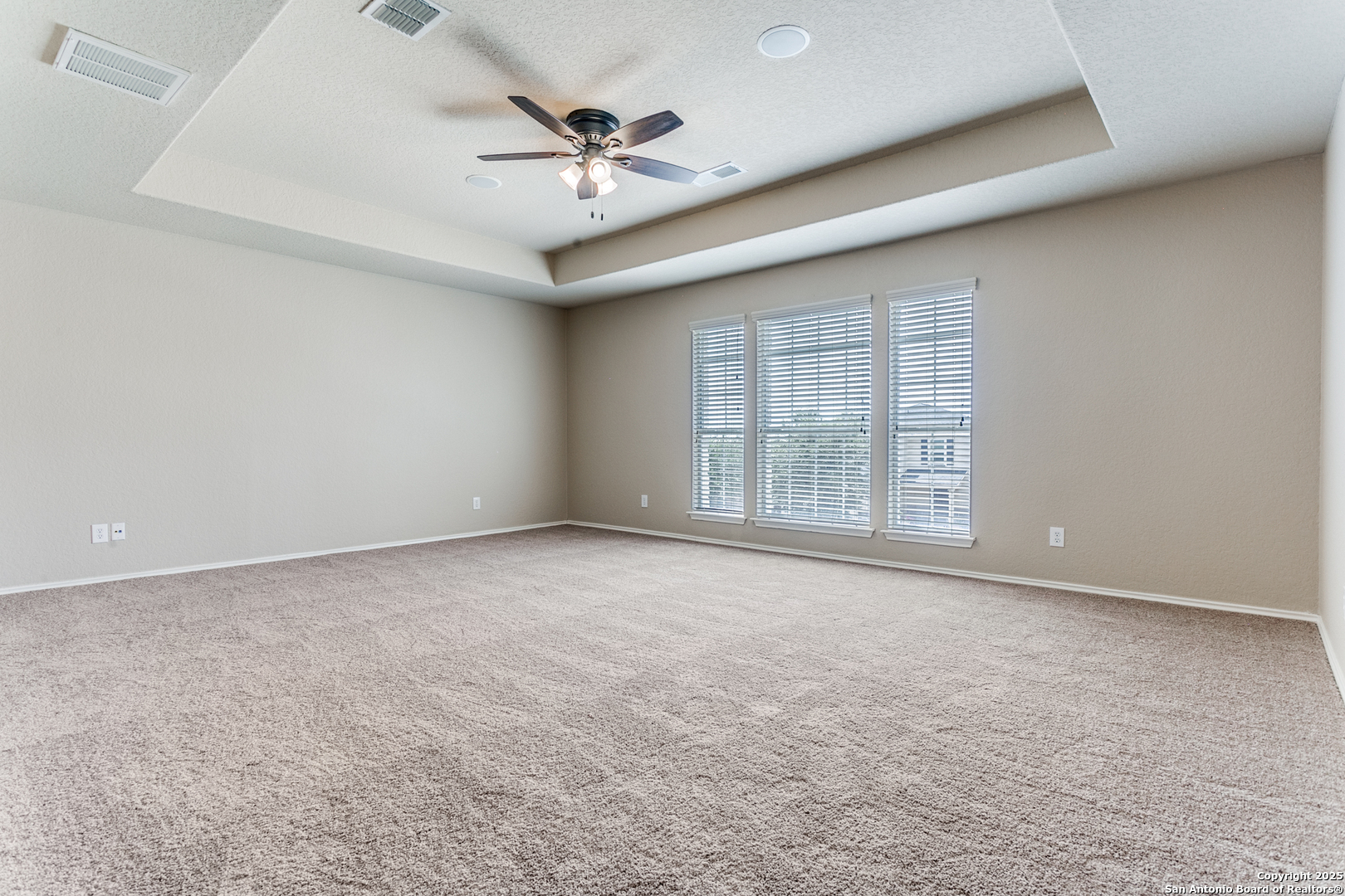 3418 Alonzo Fields Converse, TX 78109 - Photo 27 of 36 an empty room with windows and fan