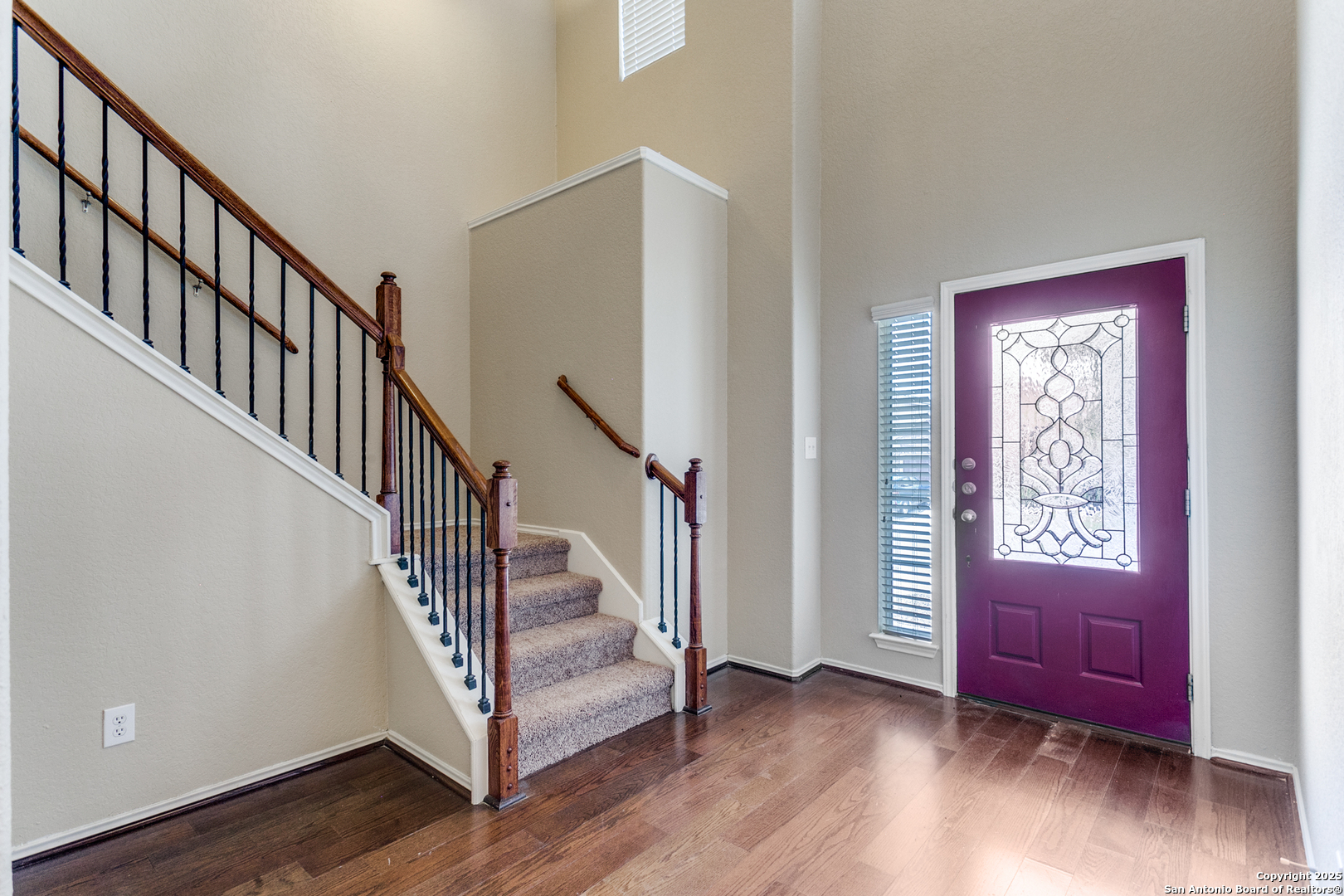 3418 Alonzo Fields Converse, TX 78109 - Photo 3 of 36 a view of front door with hallway and wooden floor