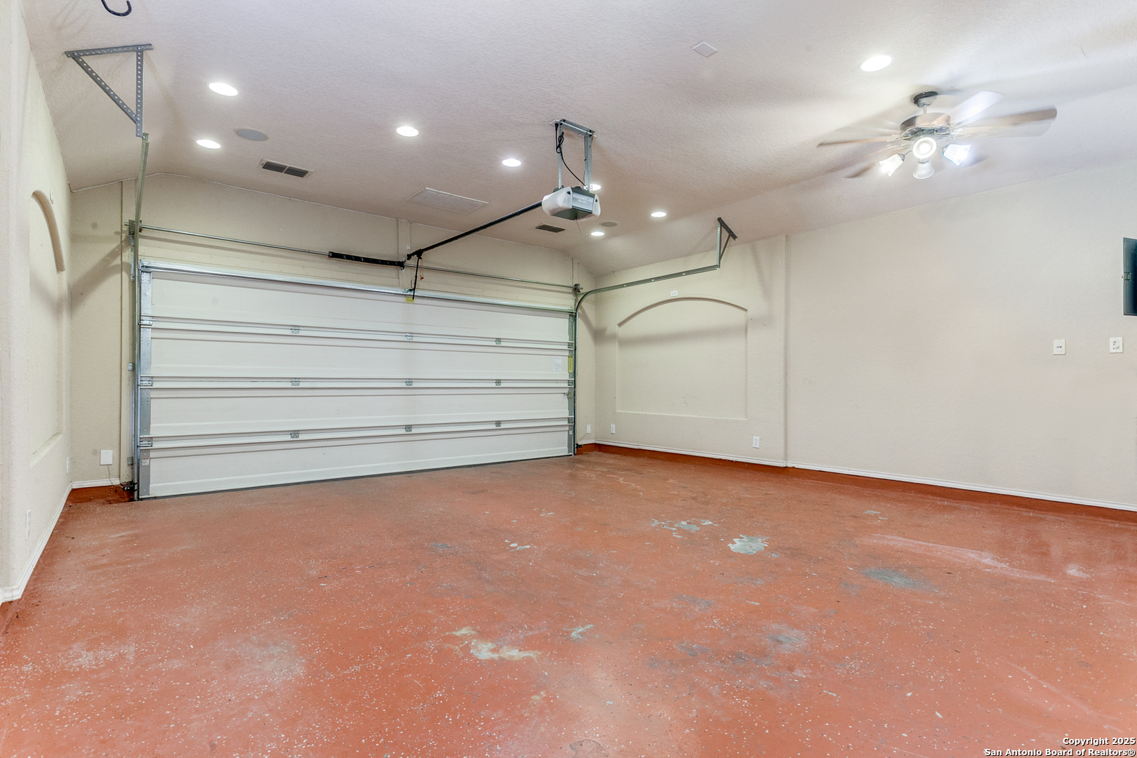 3418 Alonzo Fields Converse, TX 78109 - Photo 32 of 36 en empty room with windows and ceiling fan