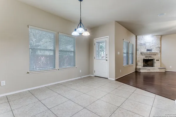 a view of livingroom with hardwood floor and kitchen