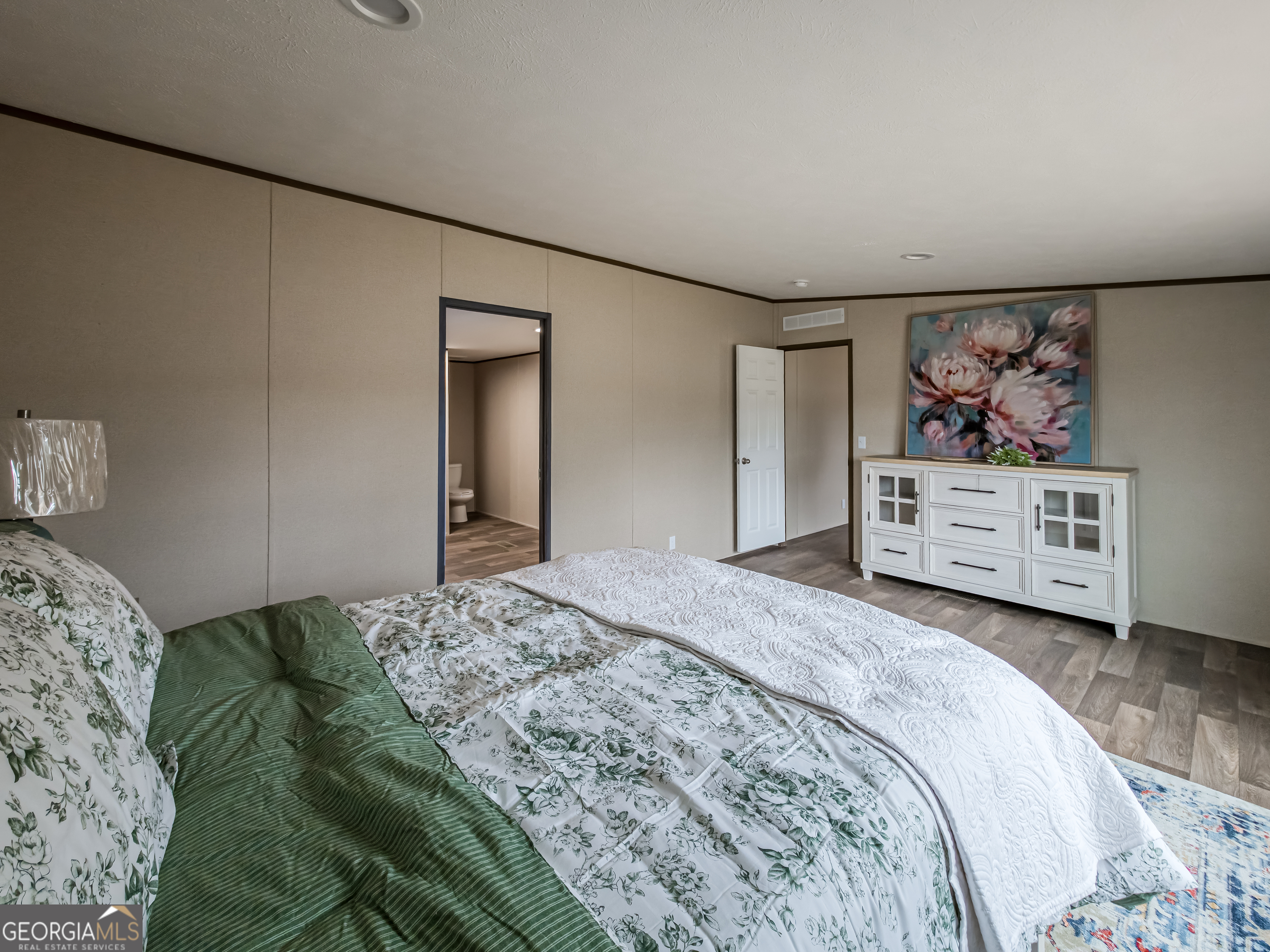 112 Courtney Circle Sumner, GA 31789 - Photo 17 of 32 a bedroom with a bed and closet