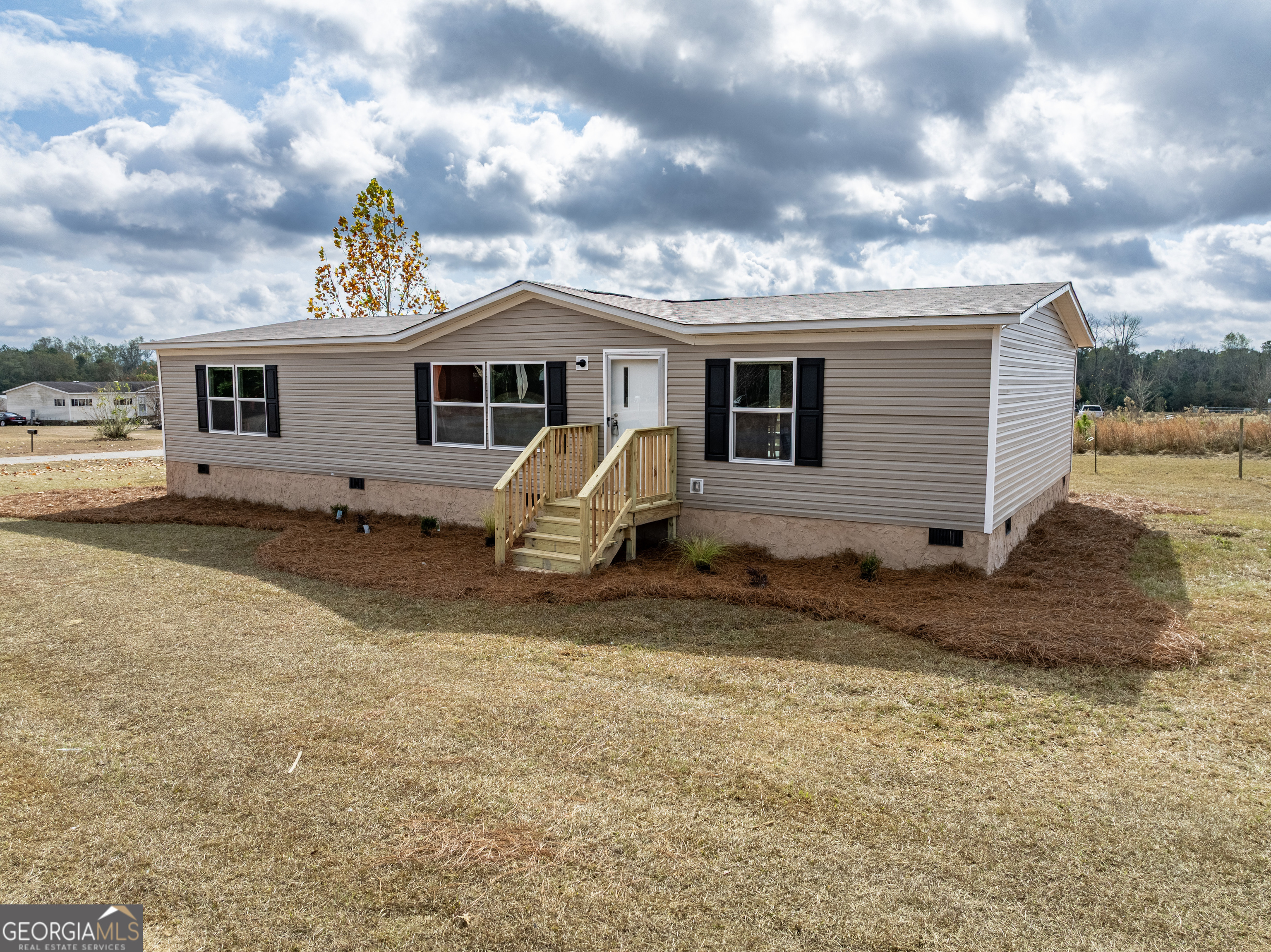 112 Courtney Circle Sumner, GA 31789 - Photo 2 of 32 a view of a house with a yard
