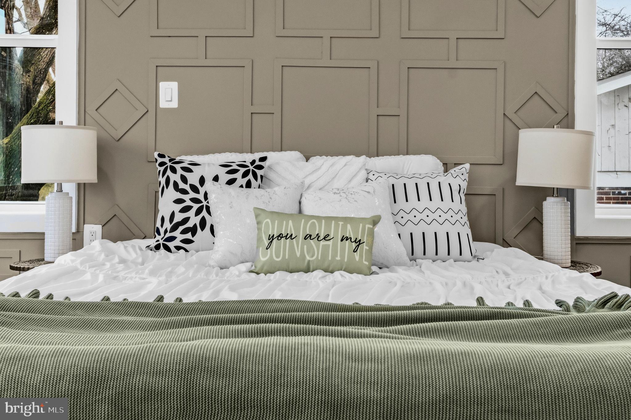 414 Waterford Road Silver Spring, MD 20901 - Photo 23 of 67 a bedroom with a bed and a lamp