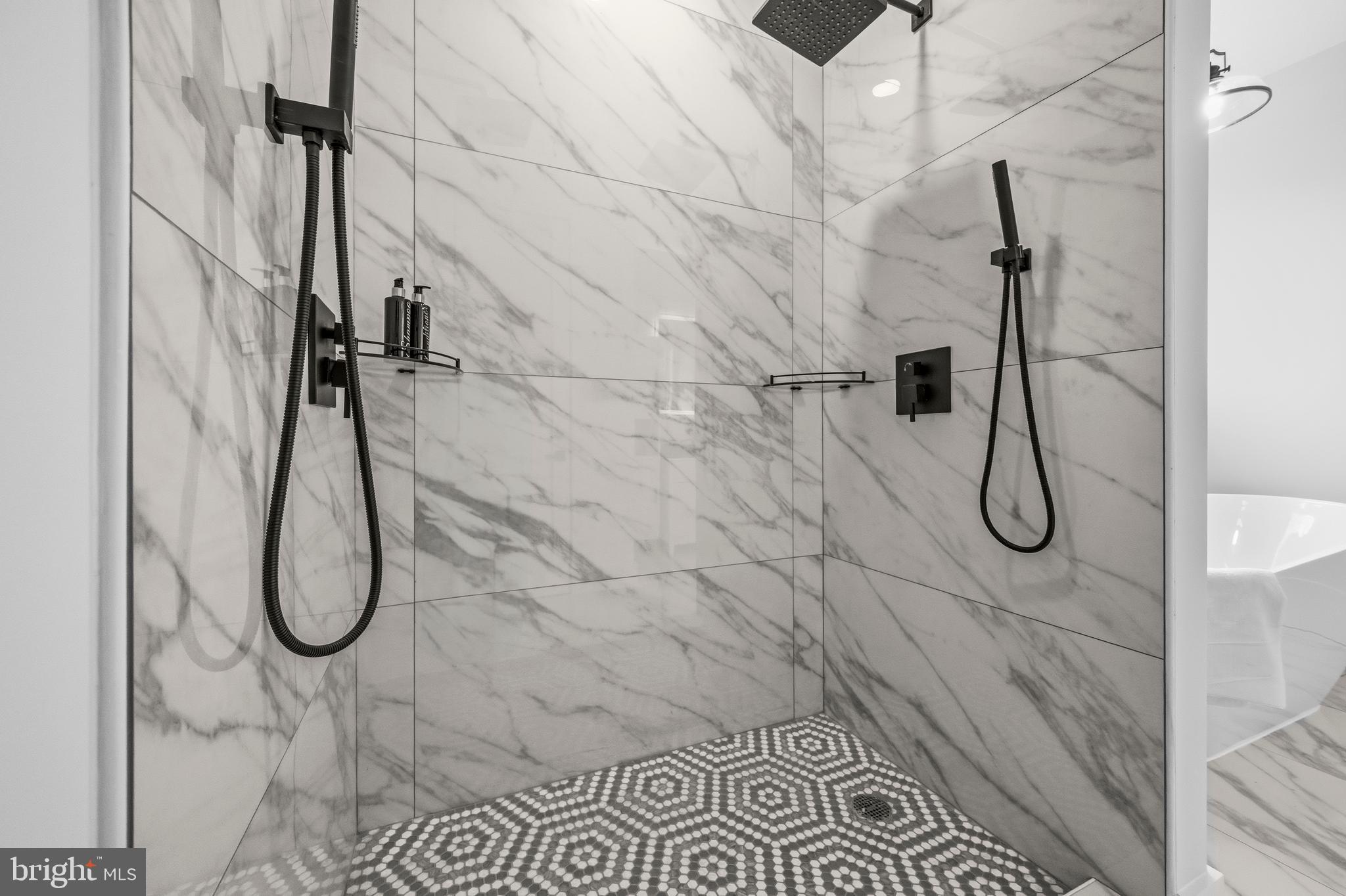 414 Waterford Road Silver Spring, MD 20901 - Photo 28 of 67 a bathroom with a glass shower