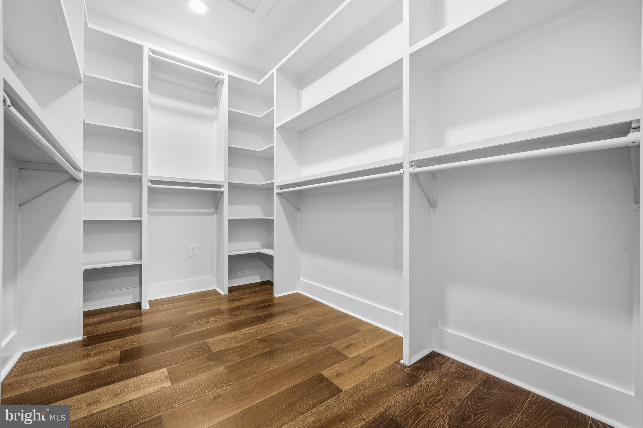414 Waterford Road Silver Spring, MD 20901 - Photo 29 of 67 a view of walk in closet with empty racks