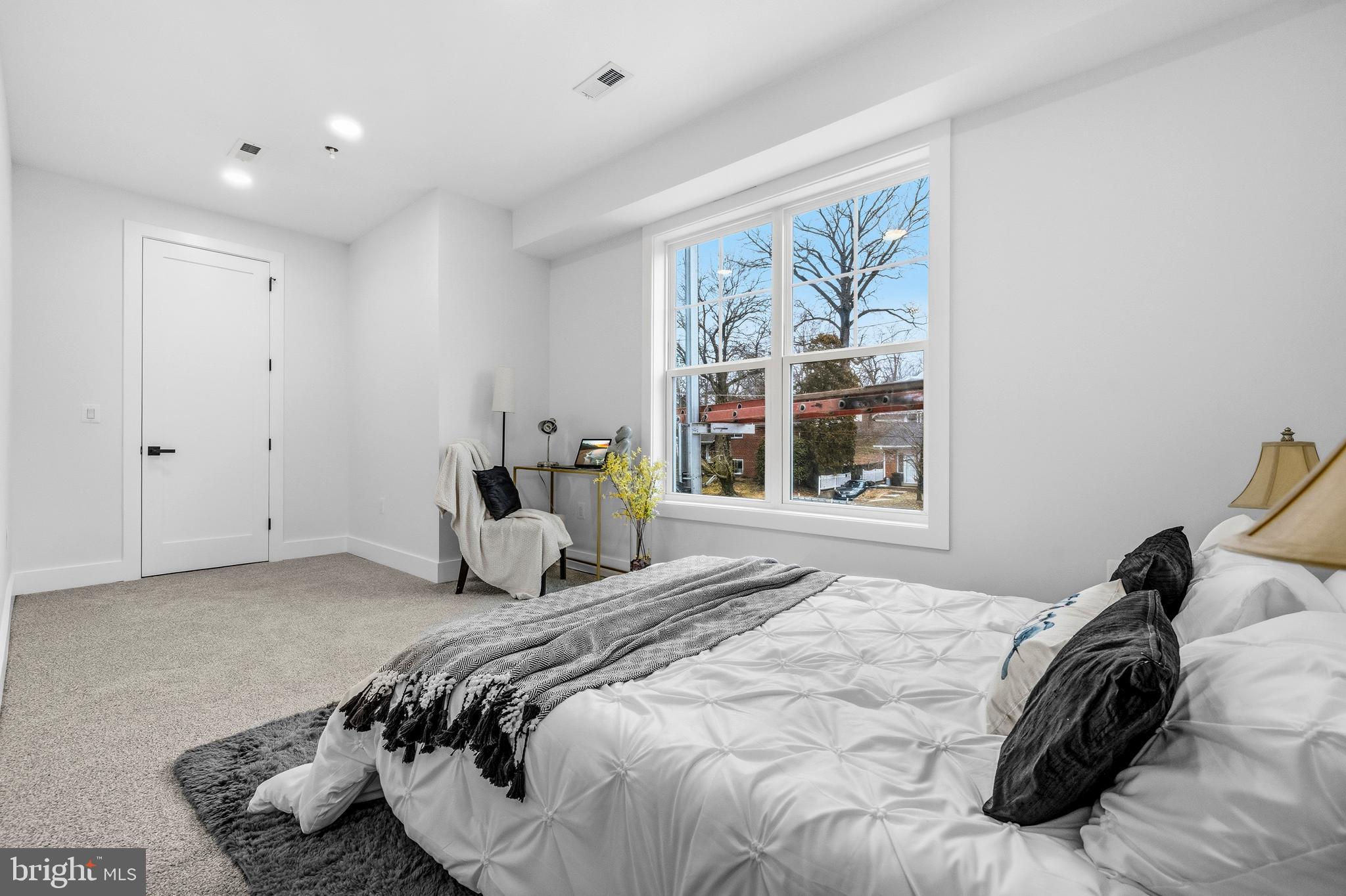 414 Waterford Road Silver Spring, MD 20901 - Photo 40 of 67 a bedroom with a bed and window