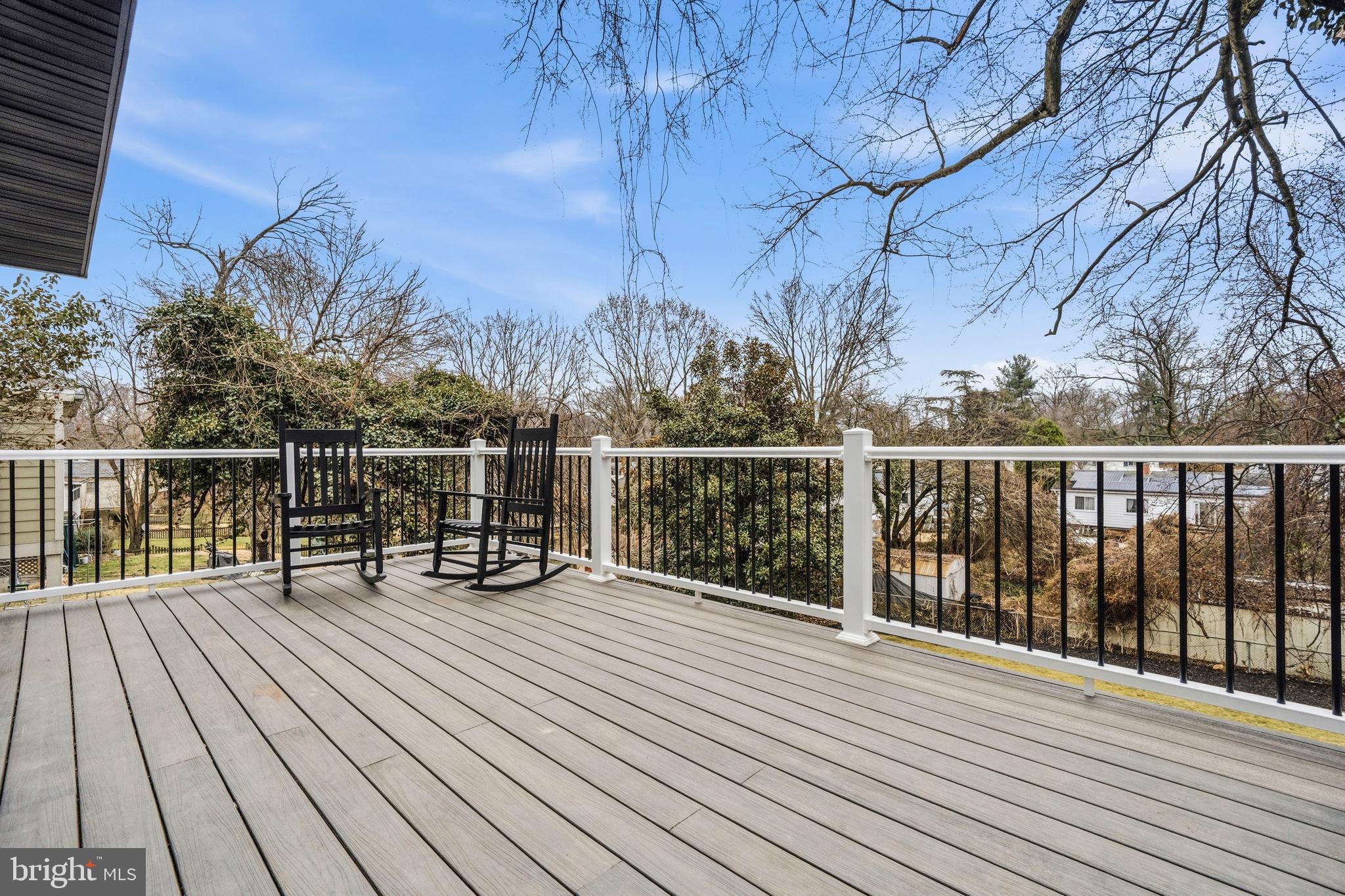 414 Waterford Road Silver Spring, MD 20901 - Photo 56 of 67 a view of a balcony with wooden floor and fence