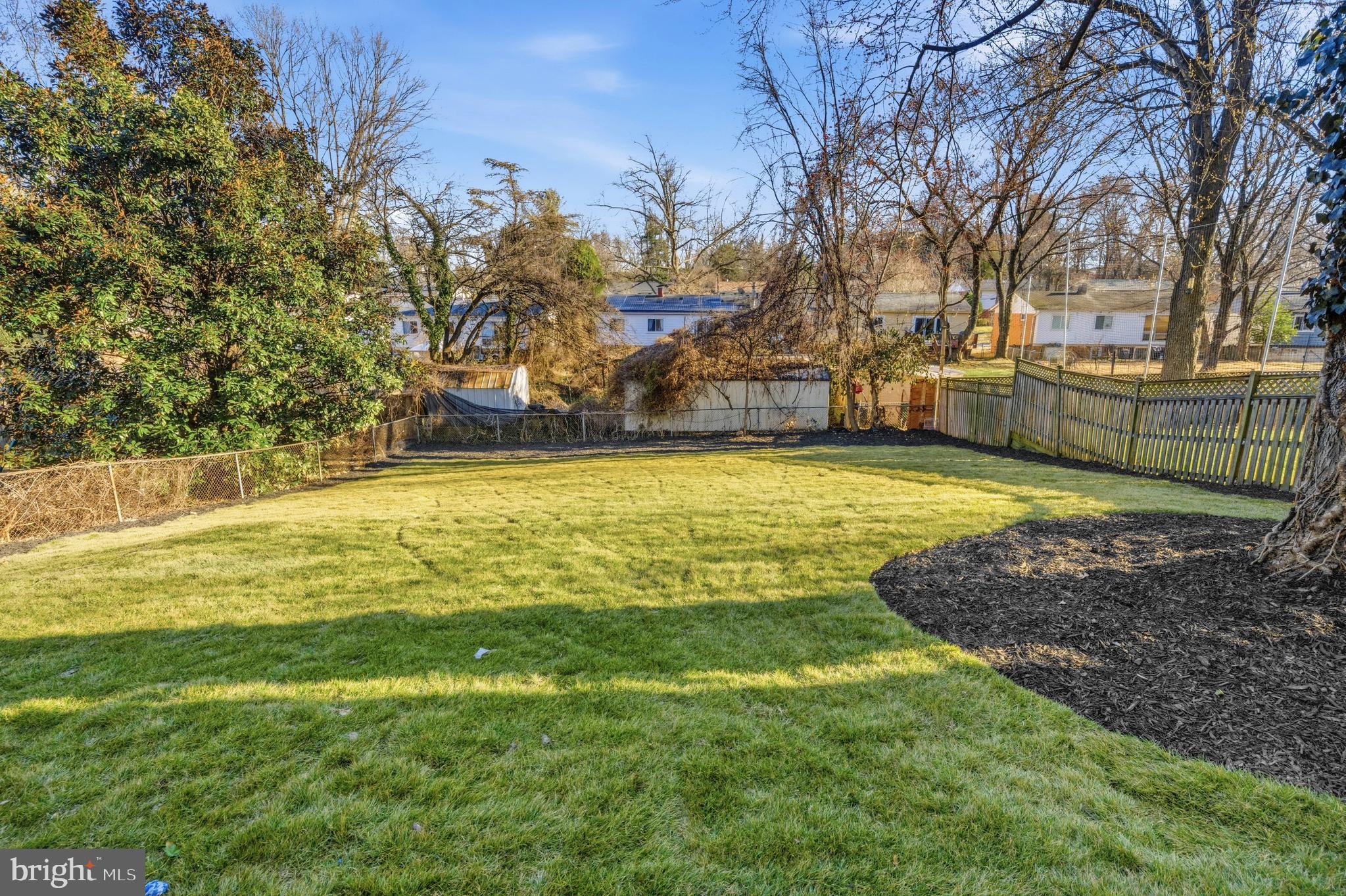 414 Waterford Road Silver Spring, MD 20901 - Photo 64 of 67 a view of a swimming pool with an outdoor space and seating area