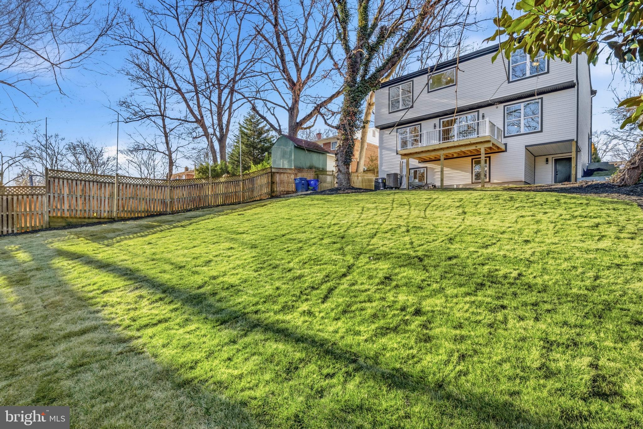 414 Waterford Road Silver Spring, MD 20901 - Photo 66 of 67 a view of a yard with a house in the background