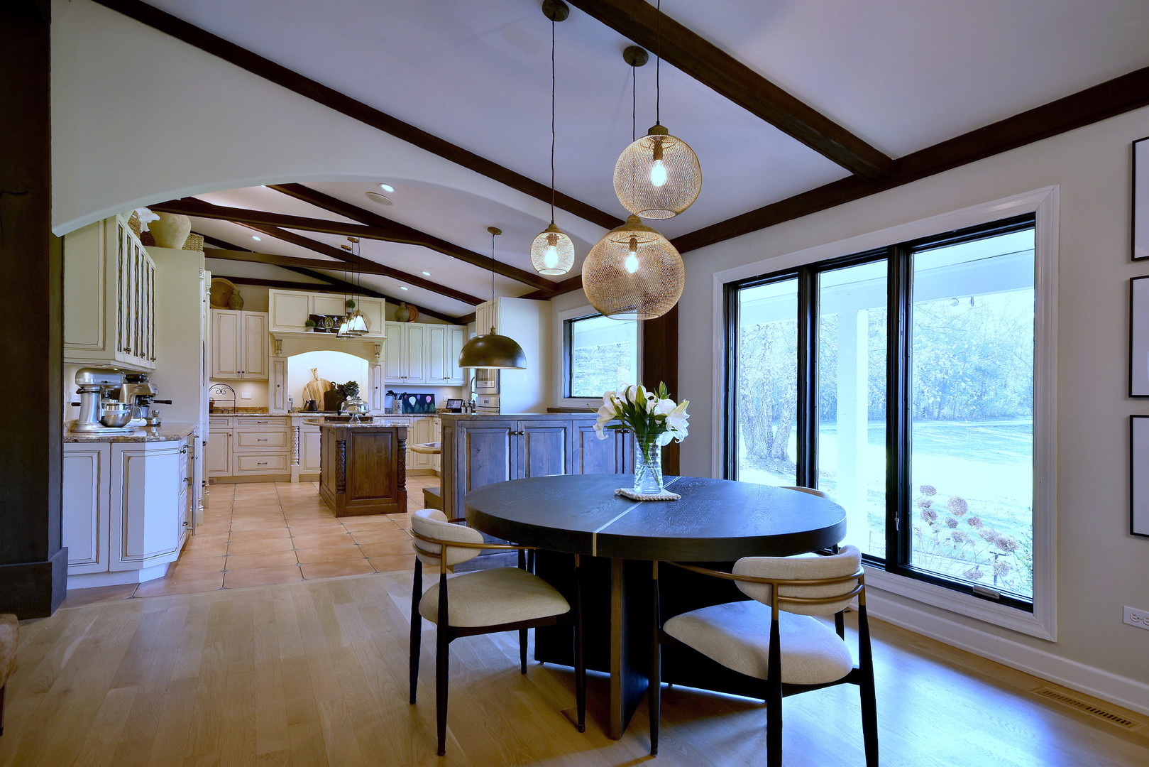 171 North Buckley Road Chicago, IL 60639 - Photo 12 of 42 a view of a dining room with furniture window and wooden floor