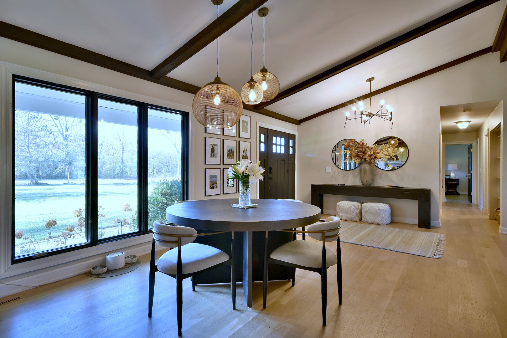 171 North Buckley Road Chicago, IL 60639 - Photo 13 of 42 a view of a dining room with furniture window and wooden floor