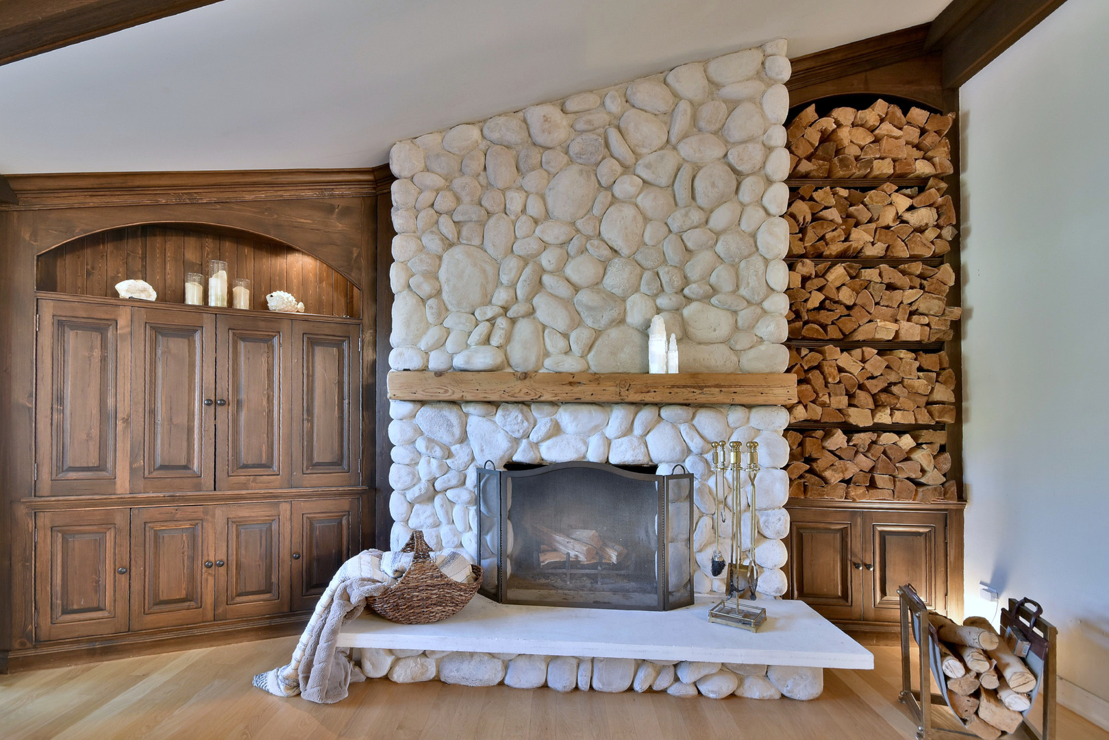171 North Buckley Road Chicago, IL 60639 - Photo 18 of 42 a living room with a fireplace with a wooden floor