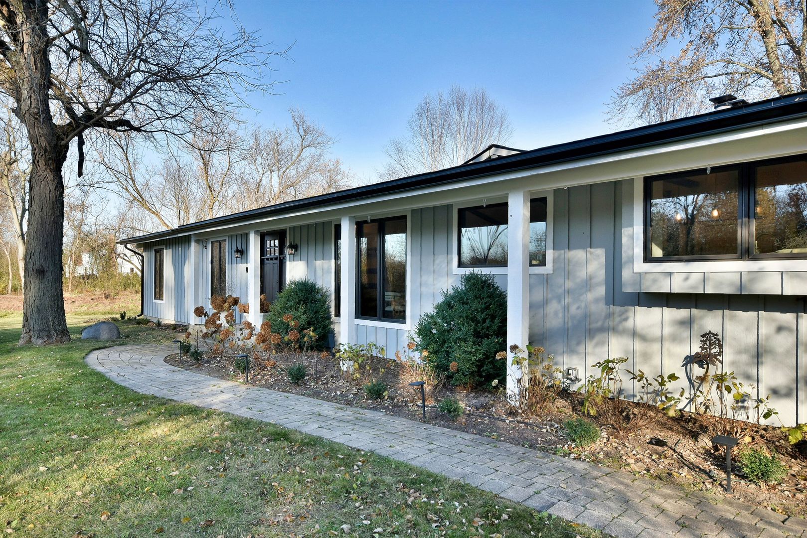171 North Buckley Road Chicago, IL 60639 - Photo 9 of 42 a front view of a house with patio