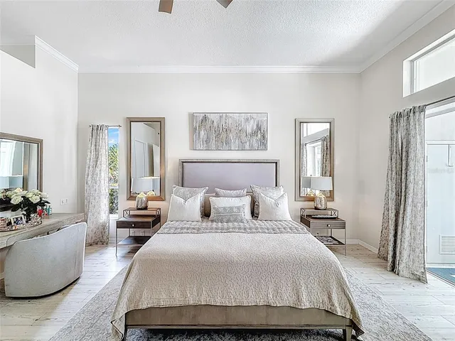 a bedroom with a bed and a couch