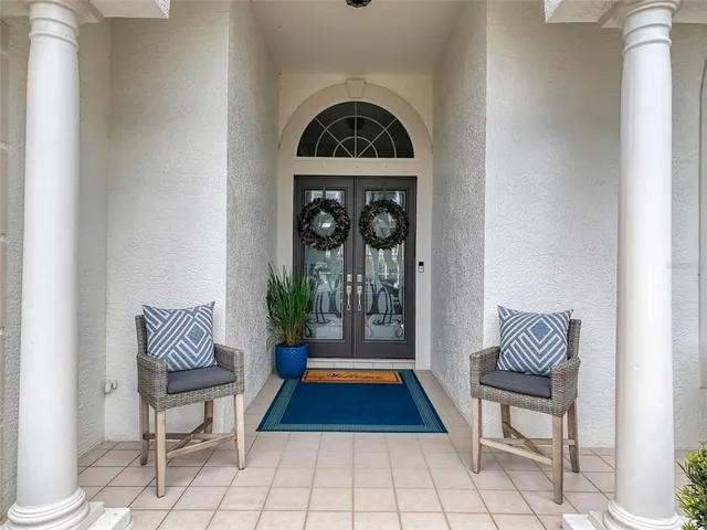 a front view of a house with a rug