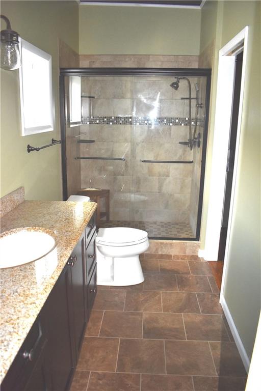 1024 Gameland Road Chicora, PA 16025 - Photo 17 of 25 Master bath with ceramic-tiled shower and granite top vanity