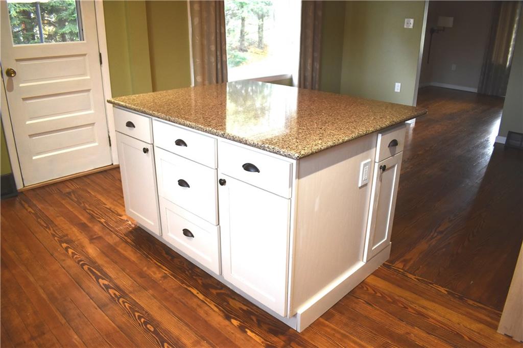 1024 Gameland Road Chicora, PA 16025 - Photo 5 of 25 Custom built island with quartz countertop, cupboards & drawers, and electric