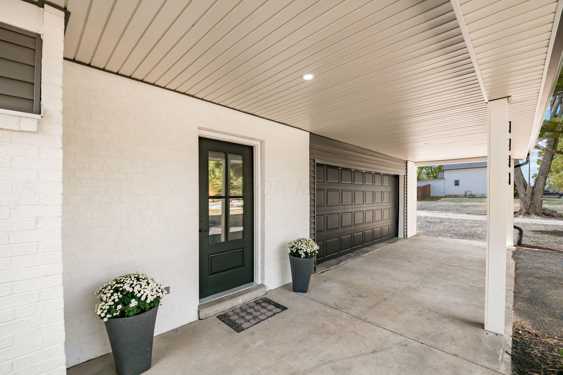3430 Cheshire Road Delaware, OH 43015 - Photo 5 of 56 Covered Front Porch
