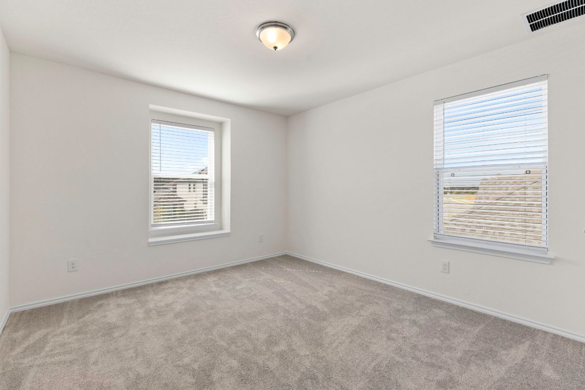 213 Skipping Stone Run Georgetown, TX 78628 - Photo 24 of 31 an empty room with a window