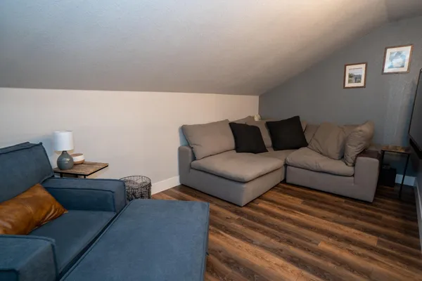 a living room with furniture and a couch