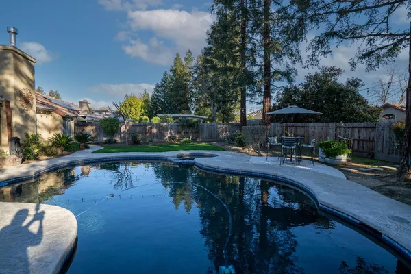 a view of swimming pool from a balcony