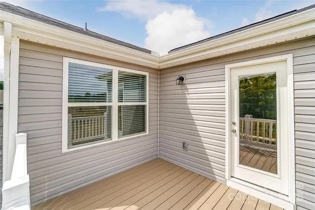 a view of a house with deck